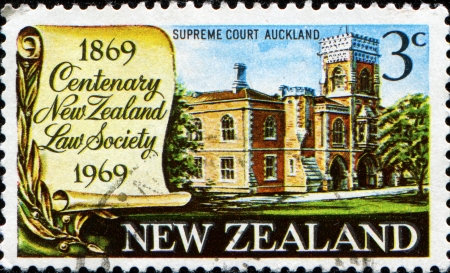 NEW ZEALAND - CIRCA 1969  A stamp printed in New Zealand honoring Centenary of New Zealand Law Society, shows Supreme Court Building, Auckland, circa 1969の写真素材