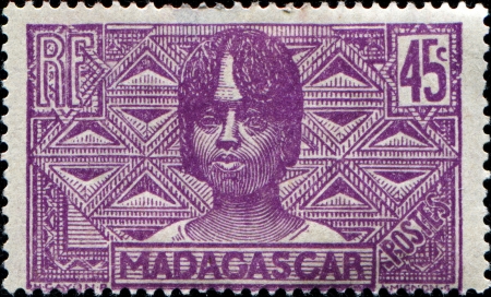 MADAGASCAR - CIRCA 1930  A stamp printed in Madagascar shows Betsileo woman, circa 1930のeditorial素材