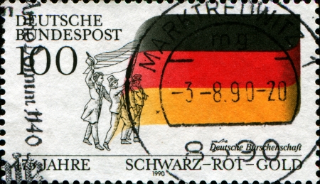GERMANY - CIRCA 1990  A stamp printed in German Federal Republic honoring 175 years of Black-Red-Gold flag, circa 1990の写真素材
