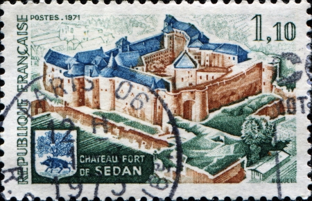 FRANCE - CIRCA 1971  A stamp printed in France shows ChÃ¢teau de Sedan is a castle situated in Sedan, France, on a headland on the border of Meuse, flanked by the rivers BiÃ¨vre and Vra, in the Ardennes dÃ©partement, circa 1971の写真素材