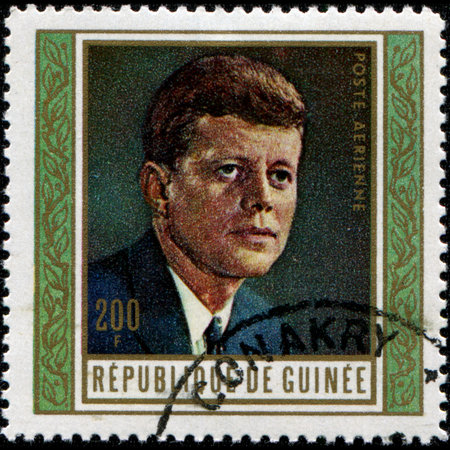 GUINEA - CIRCA 1969  A stamp printed in Guinea shows John F  Kennedy, 35th President of USA 1961-1963, circa 1969 のeditorial素材