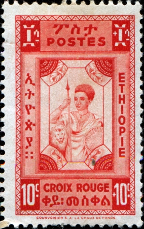 ETHIOPIA - CIRCA 1945  A stamp printed in Ethiopia shows Native soldier, circa 1945の写真素材