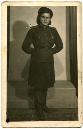 growth portrait of a woman soldier, USSR, the second half of 1940s