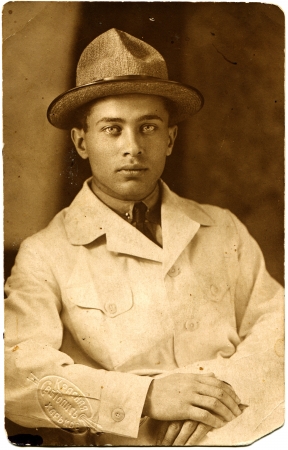 portrait of a young man in a light suit and hat, Kharkov, Ukraine, USSR, 1926, Russian text on the stamp - Red light painting, Kharkovのeditorial素材