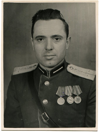 USSR - CIRCA 1951  Studio portrait of the Soviet Army lieutenant who was awarded three medals in...
