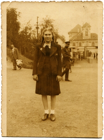 GERMANY - CIRCA 1945  Portrait of a girl with braids, in the background of a Soviet officer, Germany, circa November 7, 1945のeditorial素材