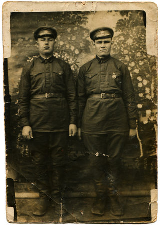 USSR - CIRCA 1930s Reproduction of photo was made in the USSR shows two officers of the Red Army,...