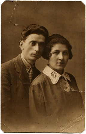 RUSSIAN EMPIRE - circa 1910s Reproduction of picture was taking in Russia shows cabinet portrait of of a couple, circa 1910s, Russian text - Kivitsky Photo  photographer name  Melitopolのeditorial素材