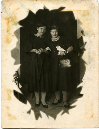 USSR - CIRCA 1939  Reproduction of picture was taking in USSR shows cabinet snapshot of two women,...