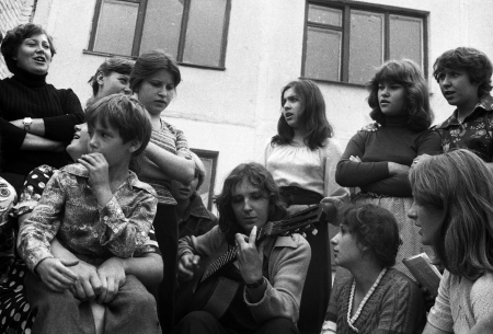 USSR - CIRCA 1973  youth with a guitar sings in the school yard, Kursk, 1973のeditorial素材