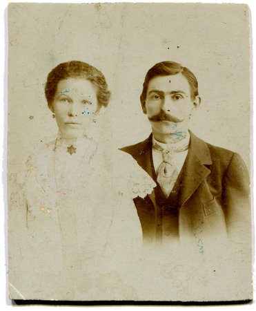 RUSSIA - CIRCA end of the XIX - the beginning of XX century  An antique photo shows couple, St...