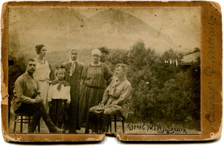 USSR - CIRCA 1924   An antique photo shows holidaymakers in the resort of Zheleznovodsk - two men, three women and a girl, the Soviet Union, the North Caucasus, 1924Russian text  resort of Zheleznovodskのeditorial素材