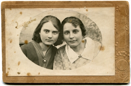 USSR - CIRCA 1933  An antique photo shows two sisters, USSR, 1933