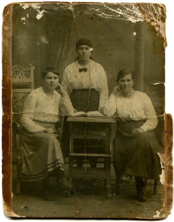 RUSSIA - CIRCA  the end of 19 - early 20 century  An antique photo shows Three women at the table, the Russian Empireのeditorial素材