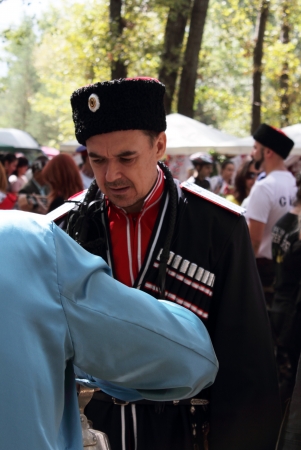STANITSA LUGANSKAYA, UKRAINE - SEPTEMBER, 8, 2012  Kuban Cossack in clothing of the late 19th century, International Cossack festival, Stanitsa Luganskaya, Ukraine, September 8, 2012のeditorial素材