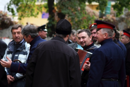  LUGANSK - OCT 14  Don Cossack singing old songs with garmon, celebration of the Protection of the...