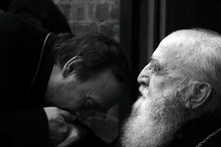 LUGANSK - NOV 4  priest kisses had of his mentor, religious procession, Lugansk, Ukraine, November...