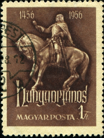  CIRCA 1956: A stamp printed in Hungary shows Janos Hunyadi on Horseback, circa 1956のeditorial素材