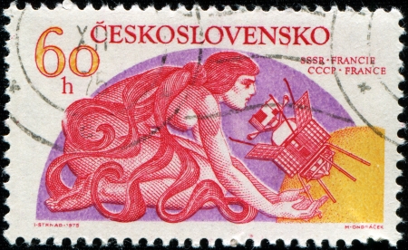 CZECHOSLOVAKIA - CIRCA 1975  A stamp printed in Czechoslovakia shows USSR - France space program - Auroa Borealis, circa 1975のeditorial素材