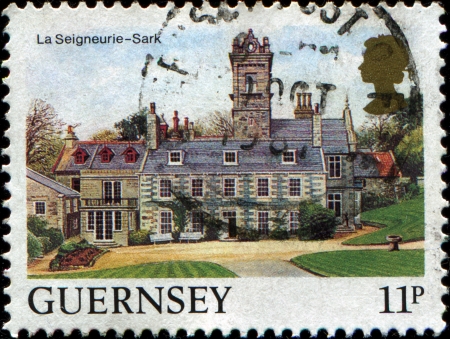 GUERNSEY - CIRCA 1984  A stamp printed in  Guernsey shows Views La Seigneurie, Sark, circa 1984のeditorial素材
