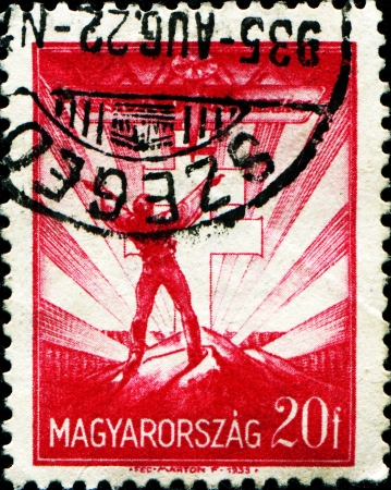 HUNGARY - CIRCA 1935  A stamp printed in Hungary shows Gift Plane from Mussolini, circa 1935のeditorial素材