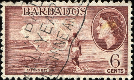  BARBADOS - CIRCA 1953  A stamp printed in Barbados shows casting  net, circa 1953 のeditorial素材