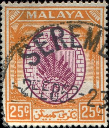  MALAYA - CIRCA 1952: A stamp printed in state Malaya shows coat of arms of Malaya, circa 1952のeditorial素材