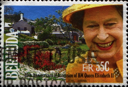 BERMUDA - CIRCA 1997  A stamp printed in Bermuda shows Queen Elizabeth II and Cottage garden, circa...