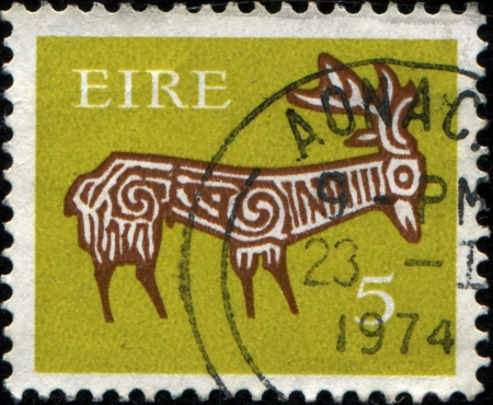 IRELAND - CIRCA 1968: A stamp printed in Ireland shows rock painting - Deer, circa 1968 のeditorial素材