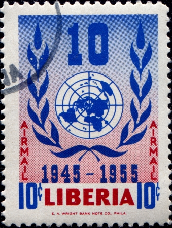 LIBERIA - CIRCA 1955  A stamp printed in Liberia shows UN embleme, circa 1955のeditorial素材