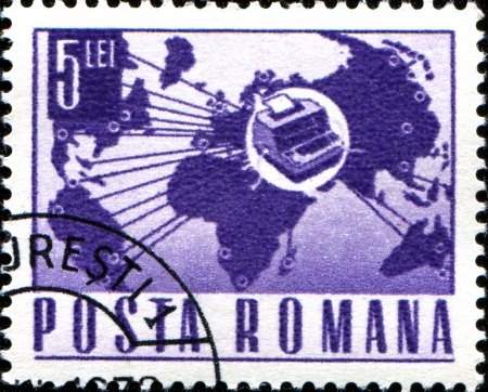  ROMANIA - CIRCA 1967  A stamp printed in Romania shows Telex instrument and world map, circa 1967 の写真素材