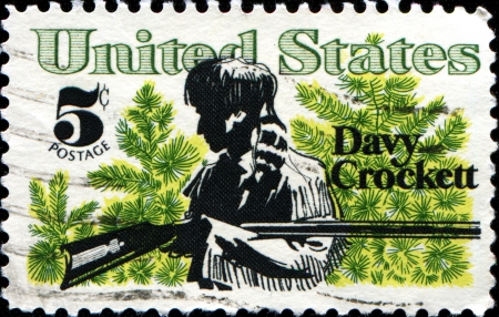 USA - CIRCA 1967  A stamp printed in  United States of America shows Davy Crockett frontiersman and congressman who died in defense of the Alamo, circa 1967 のeditorial素材