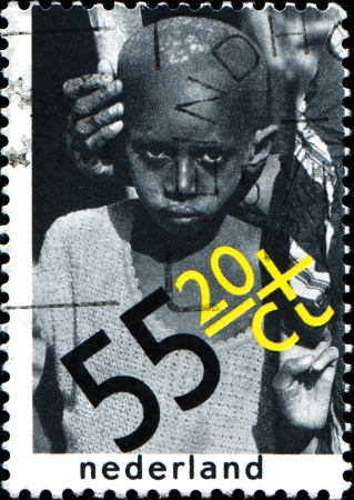 NETHERLANDS - CIRCA 1979  A stamp printed in  Netherlands dedicated Child Welfare  International Year of the Child  Senegalese boy from Sahel area  The Right to Food , circa 1979のeditorial素材