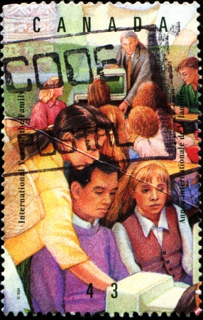 CANADA - CIRCA 1994  A stamp printed in Canada honoring International Year of Family, circa 1994のeditorial素材