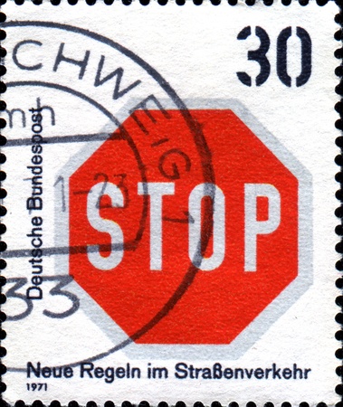 GERMANY - CIRCA 1971  A stamp printed in German Federal Republic shows road sign Stop, circa 1971の写真素材