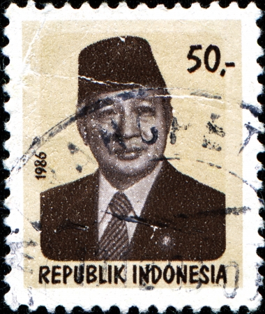 INDONESIA - CIRCA 1986  A stamp printed in Indonesia shows President Sukarno  1901-1970 , circa 1986のeditorial素材