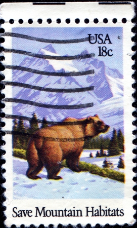 USA - CIRCA 1981  A stamp printed in United States of America shows bear and mountain, Save mountain habitats, circa 1981 のeditorial素材