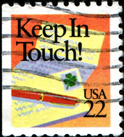 USA - CIRCA 1987  A stamp printed in United States of America shows Holidays of every faith have their cards, Keep in Touch , circa 1987のeditorial素材