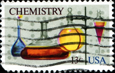 USA - CIRCA 1976  A stamp printed in United States of America shows various Flasks, separatory Funnel, computer Tape, Chemistry Issue, circa 1976 のeditorial素材