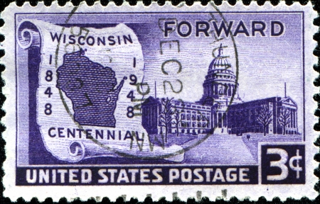 USA - CIRCA 1948  A stamp printed in United States of America shows state building, with inscription  Wisconsin Centennial 1848-1948  and  FORWARD ,  circa 1948 のeditorial素材