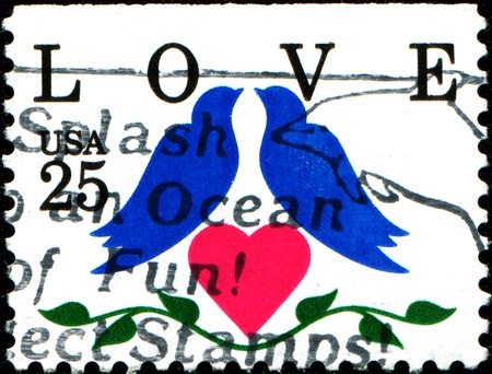 USA - CIRCA 1990  A stamp printed in United States of America shows  Love, Two Birds and Heart, circa 1990 のeditorial素材