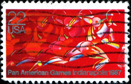 USA - CIRCA 1987  A stamp printed in United States of America shows Runner in full Stride, Pan American Games, Indianapolis, circa 1987 のeditorial素材