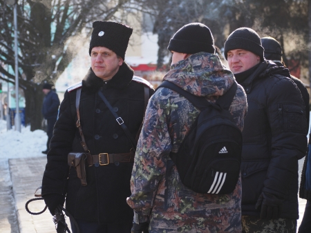 LUGANSK, UKRAINE - JANUARY 26, 2014: People in paramilitary uniforms who call themselves Cossacks...