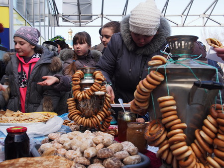 UKRAINE, LUGANSK - March 1, 2014: Maslenitsa or Pancake Week is the only purely Slavic Holiday that dates back to the pagan times. This is the celebration of the imminent end of the winter which the Orthodox Church has accommodated as a week of feasting bのeditorial素材