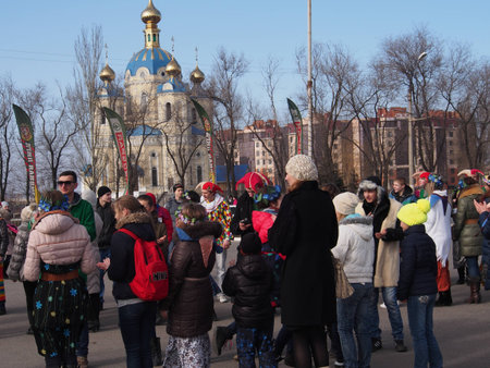 UKRAINE, LUGANSK - March 1, 2014  Maslenitsa or Pancake Week is the only purely Slavic Holiday that dates back to the pagan times  This is the celebration of the imminent end of the winter which the Orthodox Church has accommodated as a week of feasting bのeditorial素材