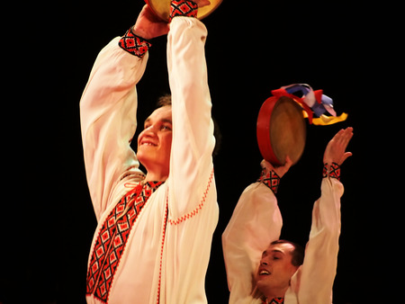UKRAINE, LUGANSK - MARCH 18, 2014  Ukrainian National Folk Dance Ensemble named After P  Virsky, who is considered best folkloric ballet dancer in country, performed a live show on stage in Luganskのeditorial素材