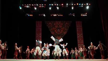 UKRAINE, LUGANSK - MARCH 18, 2014: The Ukrainian National Folk Dance Ensemble named After P. Virsky, who is considered the best folkloric ballet dancer in the country, performed a live show on stage in Luganskのeditorial素材