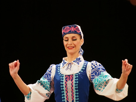 UKRAINE, LUGANSK - MARCH 18, 2014: The Ukrainian National Folk Dance Ensemble named After P. Virsky, who is considered the best folkloric ballet dancer in the country, performed a live show on stage in Luganskのeditorial素材