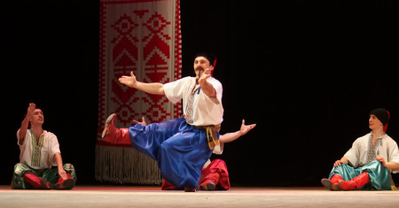 UKRAINE, LUGANSK - MARCH 18, 2014: The Ukrainian National Folk Dance Ensemble named After P. Virsky, who is considered the best folkloric ballet dancer in the country, performed a live show on stage in Luganskのeditorial素材