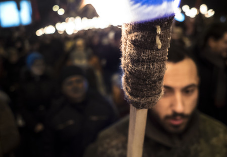 Kiev, January 1, 2015. The torchlight procession in honor of the birthday of Stepan Bandera was held in the city center. It was attended by about four thousand people - more than two times less than a year ago. In the march was attended by two parties - "のeditorial素材